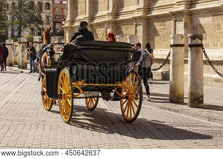Sevilla, Spain -march 03, 2022 : Horse Drawn Carriages At Plaza De Espana In Seville, Andalusia, Spa