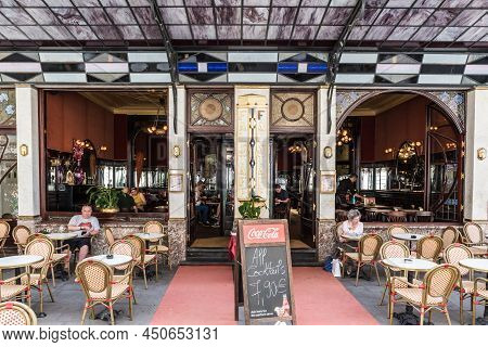Brussels Old Town - Belgium - 06 25 2019 Art Nouveau Terrace Of The Le Falstaff Typical Brasserie Wi