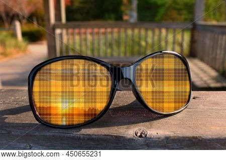 Yellow And Black Tartan Pattern On Sunglasses - Conceptual Of Scottish Culture Of The Town Of Kincar
