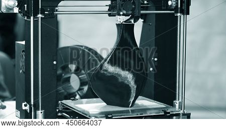 3d Printer Printing A Model In The Form Of Black Vase Close-up
