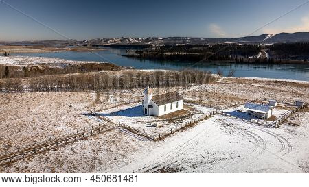 Aerial View Of The Historic George Mcdougall United Church With Ghost Lake At Background In Alberta 