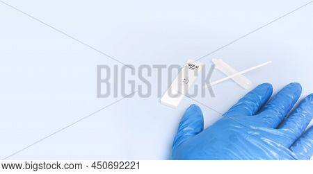 Covid-19 Positive Test Result With Sars Cov-2 Rapid Antigen Test Kit (atk) On Blue Floor With Copy S