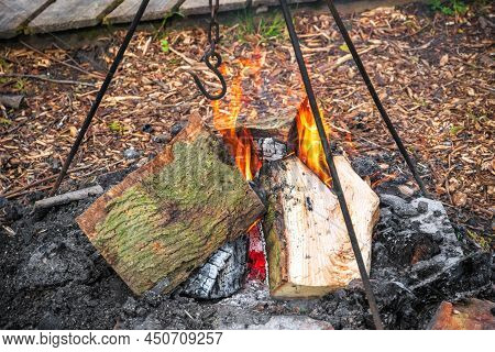 Campfire, Burning Wood At A Tourist Campsite In England