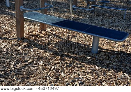Outdoor Gym In The Yard With Stone Sandstone Wall And Flexible Rubber Floor. Sports Ground With Fitn