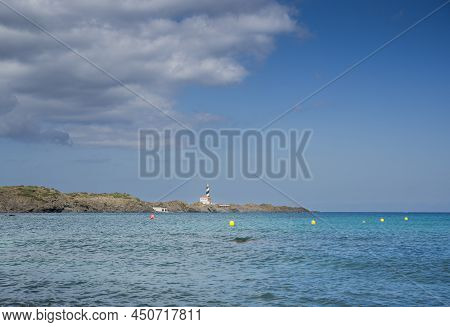 Lighthouse Of Favaritx From Cala Presili, Municipality Of Mahon, Menorca, Spain