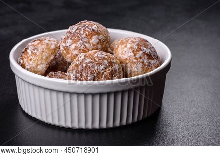 Tasty Homemade Gingerbread Cookies On Dark Concrete Table