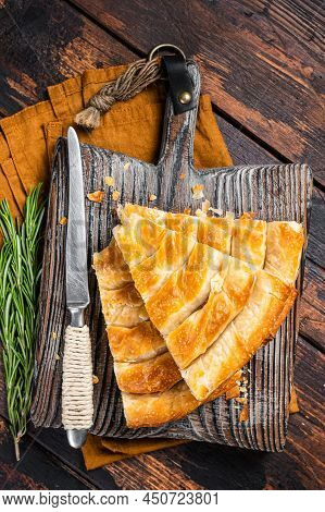 Homemade Greek Spanakopita Pie With Organic Cheese On Wooden Board. Wooden Background. Top View