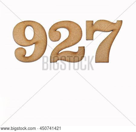 Number 927 In Wood, Isolated On White Background