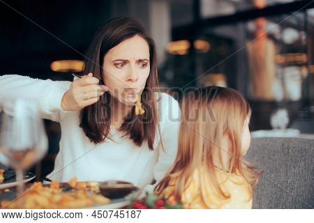 Angry Mom Force Feeding Her Little Toddler With No Appetite