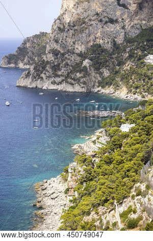 Capri Island, Italy - July 28, 2021: Aerial View Of Rocky Shoreline On The Tyrrhenian Sea Nearby Mar