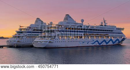 2 Cruises Ships Waiting In Tallinn Harbour For A Return Sail Date Ships. Sunset Time In Harbour. Lux