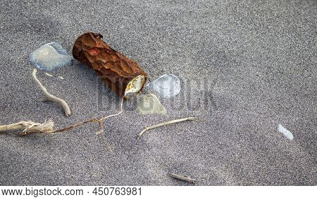 Metal Can On The Beach. Ecological Problem In The World, Waste Disposal. Environment
Concept.