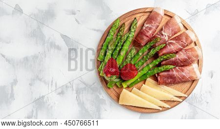 Asparagus. Bunch Of Fresh Asparagus, Jamon, Ham, Prosciutto Pickled Green Asparagus. Close Up. Keto 