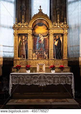 Venice, Italy - January 4 2022: Madonna With Child And Saints Triptych, Painted By Giovanni Bellini 