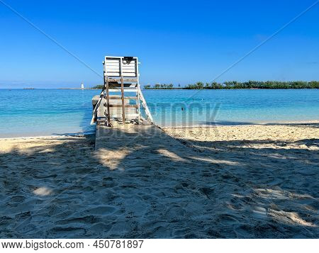 People Enjoying Junkanoo Beach In Nassau, Bahamas.