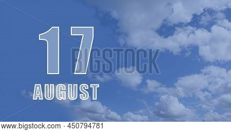 August 17. 17-th Day Of The Month, Calendar Date.white Numbers Against A Blue Sky With Clouds. Copy 