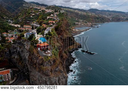 Picturesque Drone View Of Ponta Do Sol Settlement With Residential Buildings Located On Rocky Hill N