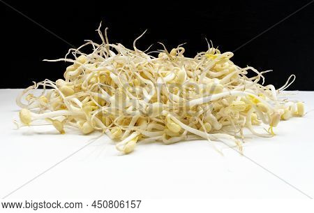 Green Soybean Sprout On Black And White Background