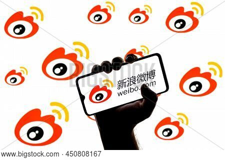 Kazan, Russia - Mar 10, 2022: Smartphone With Weibo Chinese Microblogging Service Logo On Screen In 