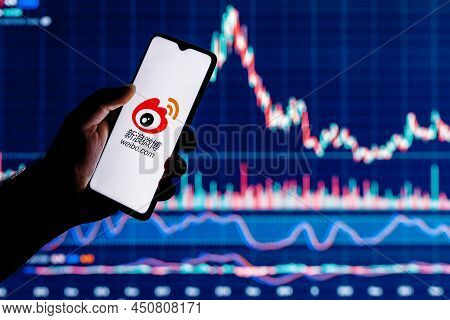 Kazan, Russia - Mar 10, 2022: Smartphone With Weibo Chinese Microblogging Service Logo On Screen. We