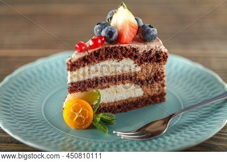 Chocolate Sponge Cake With Oat Bran And Almond Flour, Garnished With Blueberries, Pomegranate Seeds,