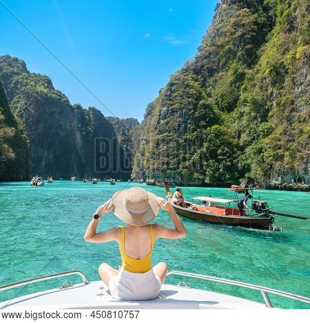 Woman Tourist On Boat Trip, Happy Traveller Relaxing At Pileh Lagoon On Phi Phi Island, Krabi, Thail