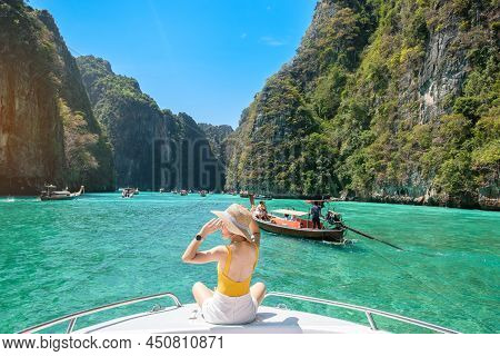 Woman Tourist On Boat Trip, Happy Traveller Relaxing At Pileh Lagoon On Phi Phi Island, Krabi, Thail