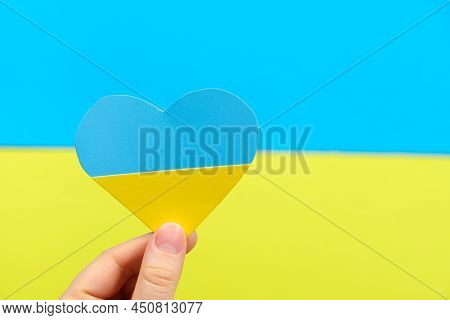 Yellow-blue Heart In The Color Of The Flag Of Ukraine In The Hand Of A Person, A Place For Text. Lov