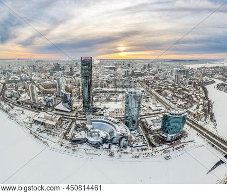Yekaterinburg Aerial Panoramic View In Winter At Sunset. Yekaterinburg City And Pond In Winter.