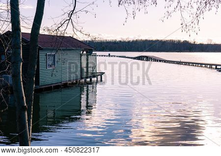 Derito To Lake In Tata Hungary With Cute Colorful Fishing Cabin And Pier