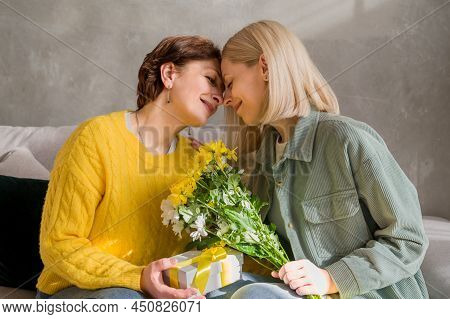Closeup Of Mother And Daughter Sharing Sweet Moment And Bondaing. Mother's Day, Birthday,internation