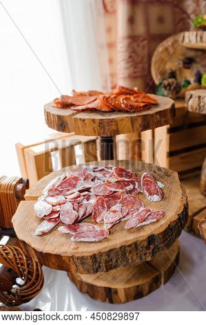 Slicing Different Types Of Meat. Meat Snacks On The Table. Wedding Buffet. Catering