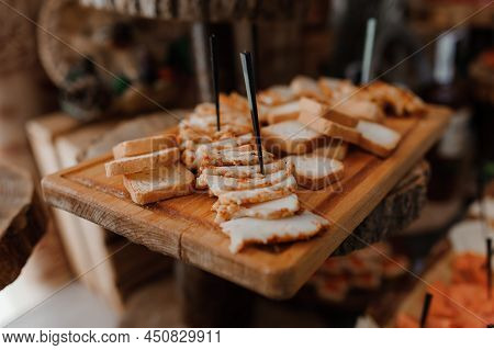 Slicing Different Types Of Meat. Meat Snacks On The Table. Wedding Buffet. Catering