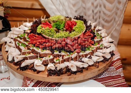 Slicing Different Types Of Meat. Meat Snacks On The Table. Wedding Buffet. Catering