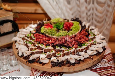 Slicing Different Types Of Meat. Meat Snacks On The Table. Wedding Buffet. Catering