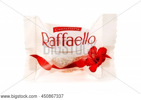 Ferrero Raffaello In A Separate Package. Isolated On White Background. Raffaello Is A Round Coconut 