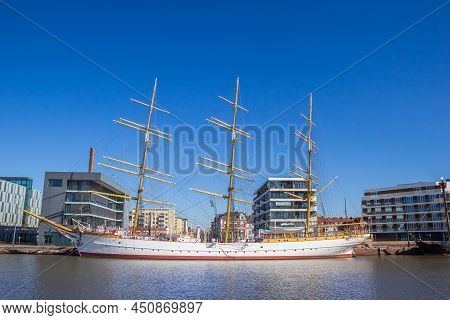 Bremerhaven, Germany - March 09, 2022: Tall White Ship In The Neuer Hafen Harbor Of Bremerhaven, Ger