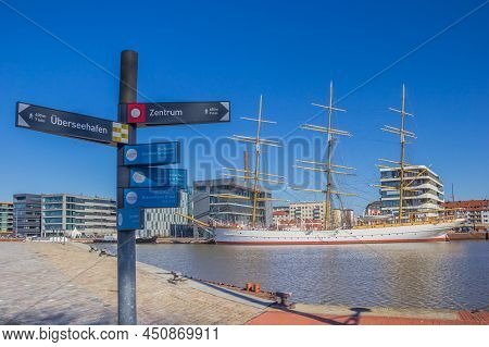 Bremerhaven, Germany - March 09, 2022: Tourist Sign In Front Of The Tall Ship In Bremerhaven, German