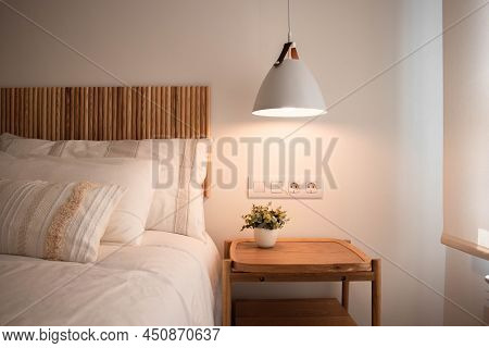 Close Up Of Minimalist And White Bedroom In Partamento