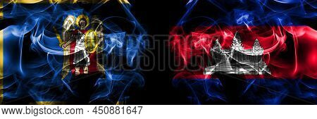 Kyiv, Kiev Vs Cambodia, Cambodian, Khmer Flag. Smoke Flags Placed Side By Side Isolated On Black Bac