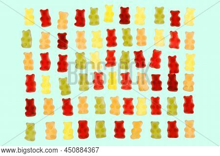 Jelly Bears Candy Isolated On A Blue Background.jelly Low-calorie Sweets. Childrens Dessert.jelly Mu