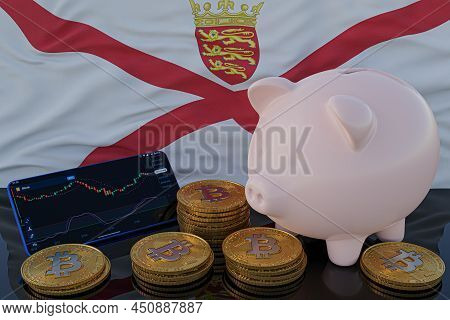 Bitcoin And Cryptocurrency Investing. Jersey Flag In Background. Piggy Bank, The Of Saving Concept. 