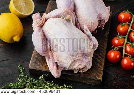 Raw Coquelet Chickens Meat With  Ingredients, On Old Wooden Table