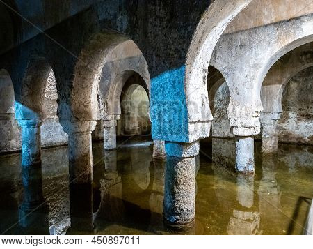Moorish Cistern Aljibe In Caceres. This Building Was A Mosque Under The Muslim Rule In Spain. Old Ar