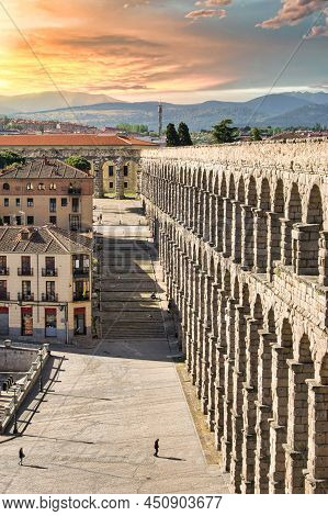 Vertical Photograph Of The Millenary Roman Aqueduct Of Segovia, Spain