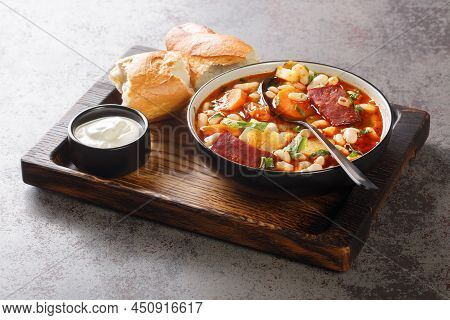 Hungarian Goulash Soup With Beans, Meat And Vegetables Close-up In A Bowl On The Table. Horizontal