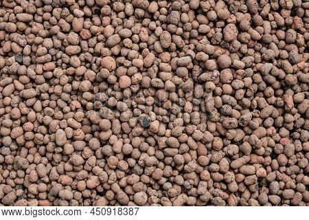 Top View On A Seamless Abstract Background From Expanded Clay. Clayd Claydite Granules As A Drainage