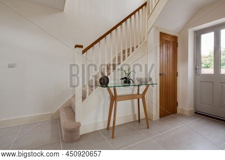 Radwinter, Essex - Sept 12 1018: Modern Furnished Entrance Hall With Stairs And Glass Topped Table W
