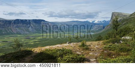 Panoramic Scenic View Of Glacial Rapadalen River Delta Valley With Skierffe Rock Summit At Sarek Nat