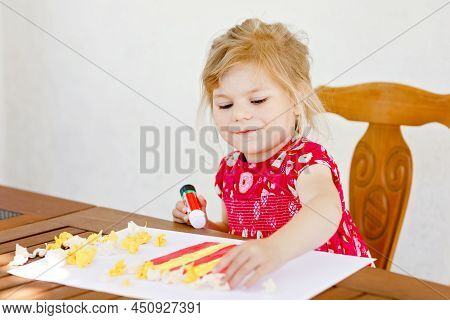 Little Creative Toddler Girl Painting With Finger Colors Popcorn Box And Making Paper Corns With Glu